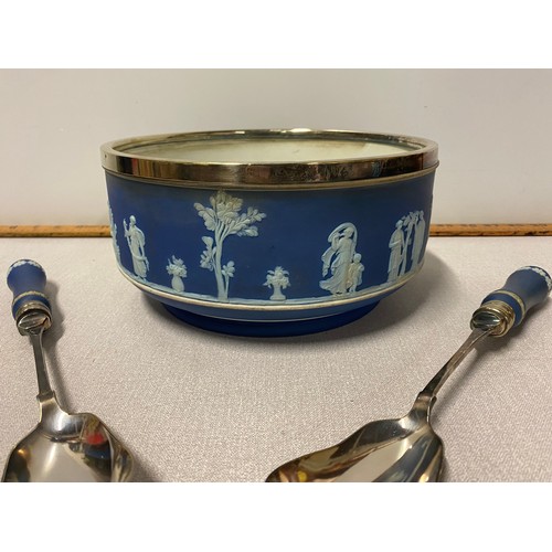 71 - Wedgewood Jasper ware salad bowl with matching spoon and fork. 23cm diameter.