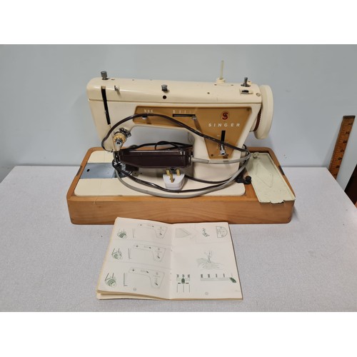 94 - Vintage Singer 237 sewing machine with manual.