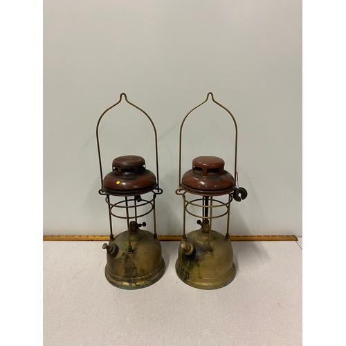 42 - Pair of vintage metal storm lamps.