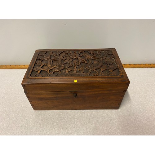 54 - Oriental carved wooden box.