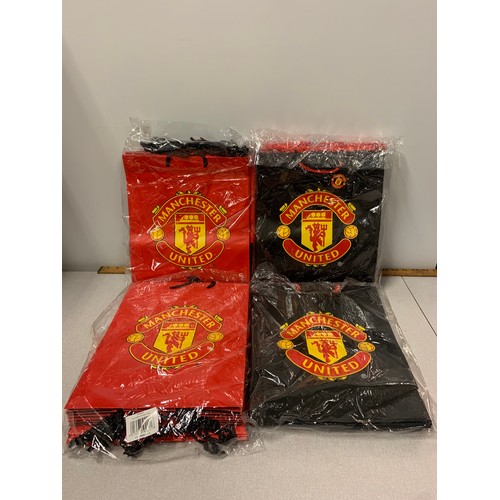 146 - Selection of new Manchester United gift bags.