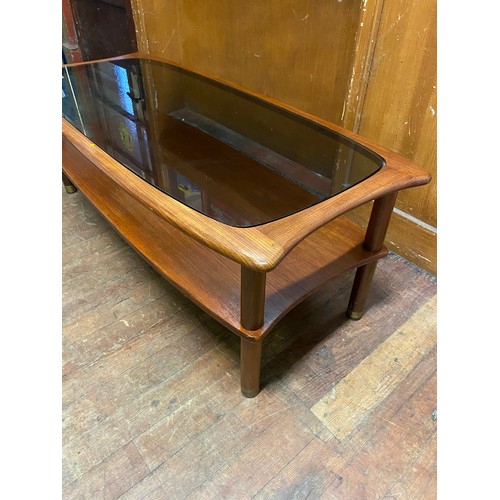 157 - Mid century glass topped coffee table.