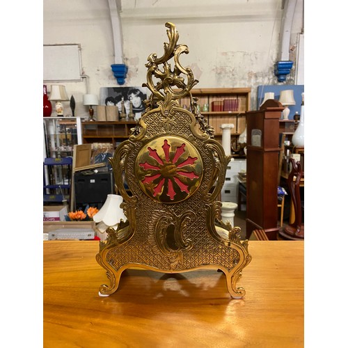 161 - Ornate brass mantle clock with Franz Hermle movement Robert Grant London.
44cm Tall