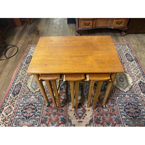 236 - mid century teak Danish style nest of tables.