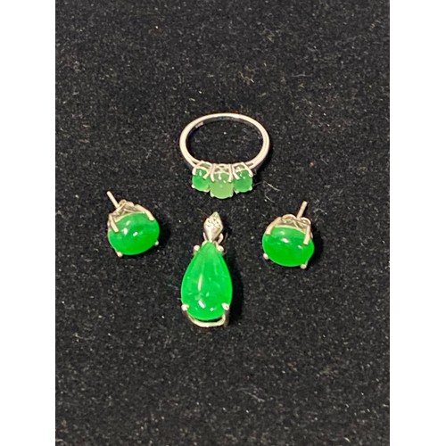 200 - Hallmarked silver and green gem stone ring, earring and pendant set.