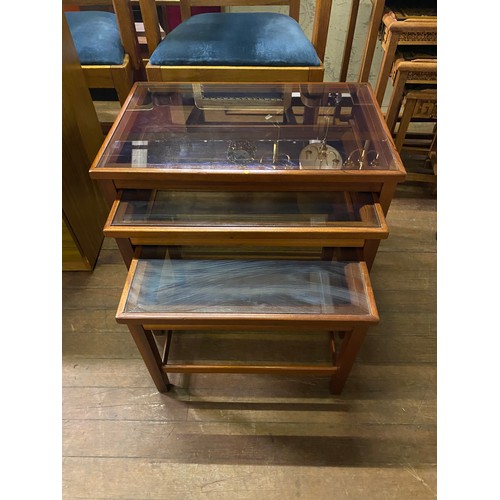 229 - Nest of 3 glass topped mid century tables.