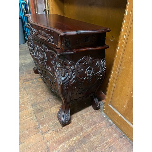 244 - Antique ornate French style serpentine hand carved mahogany chest.
106cm l x 80cm h x 40cm d