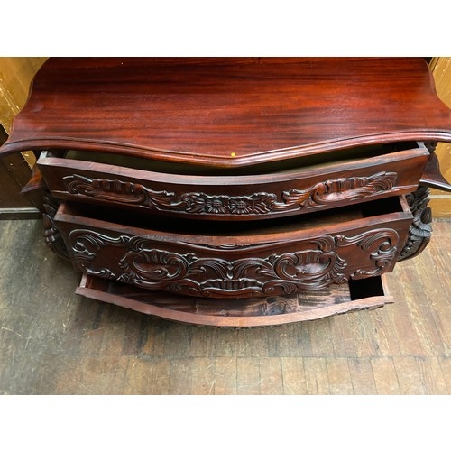 244 - Antique ornate French style serpentine hand carved mahogany chest.
106cm l x 80cm h x 40cm d