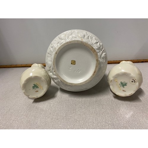 267 - Pair of Belleek bud vases along with ceramic water jug depicting cherubs.