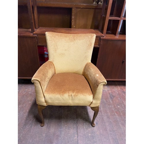 285 - Vintage upholstered arm chair on Queen Ann legs.