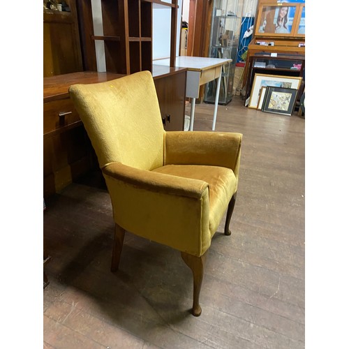 285 - Vintage upholstered arm chair on Queen Ann legs.