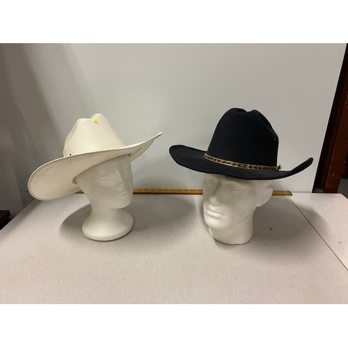 286 - 2 x cowboy hats.