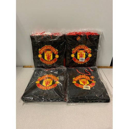 291 - Selection of new Manchester United gift bags.