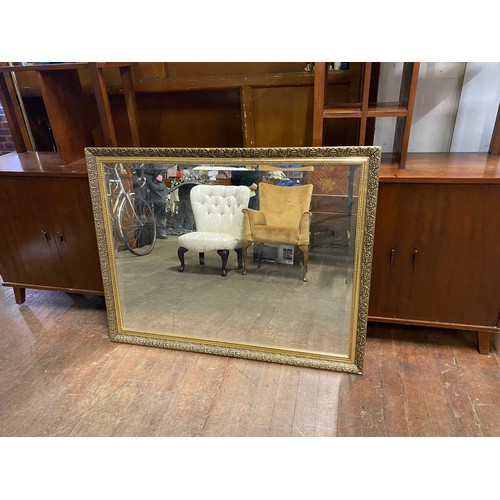 310 - Large gilt framed wall mirror.
111cm x 86cm