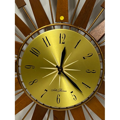 362 - large Vintage Seth Thomas Mid Century sunburst teak wall clock. 66cm diameter. working