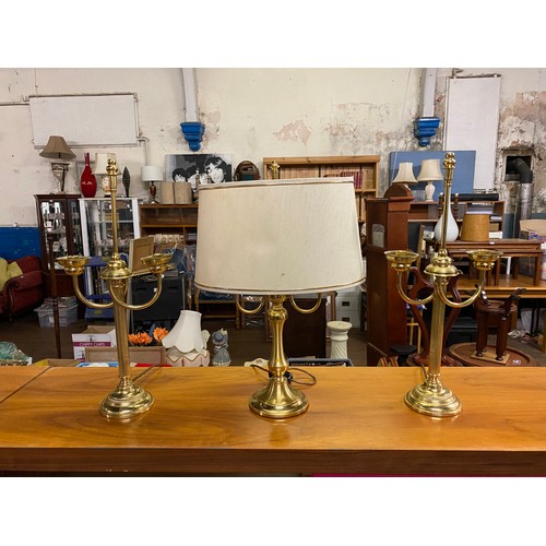 505 - Pair of brass candlestick lamps along with one other.
56cm Tall