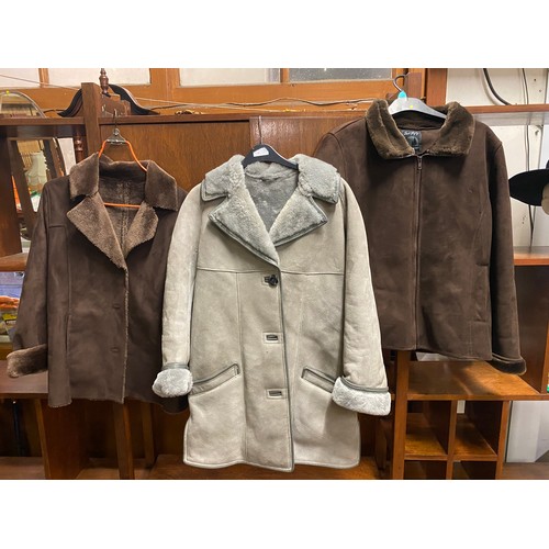 660 - 3 x sheepskin coats.