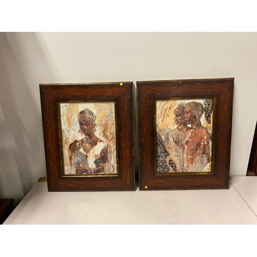 671 - 2 framed African woman prints.