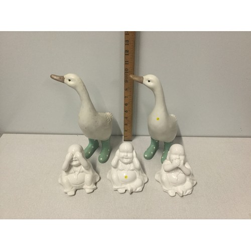 14 - Pair of duck ornaments along with 3 wise Buddha figures.
Tallest 28cm