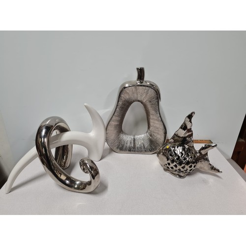 16 - Metal pear and fish sculpture and metal and ceramic abstract sculpture.
Tallest 29cm