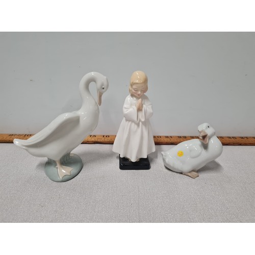 25 - 2 Nao ducks and Royal Doulton bedtime figure. Tallest 15cm