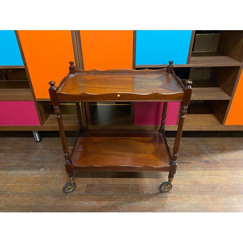 43 - Vintage solid wood serving trolley on casters.