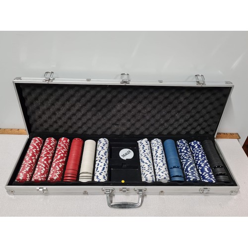 74 - Poker set in metal case.