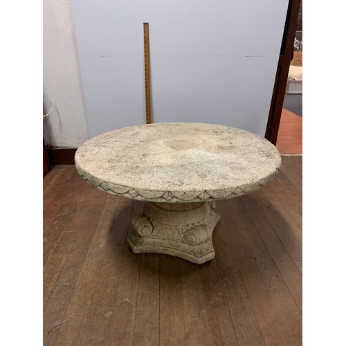 66 - Heavy stone, 2 piece garden table.
78cm diameter