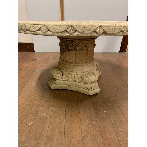 66 - Heavy stone, 2 piece garden table.
78cm diameter