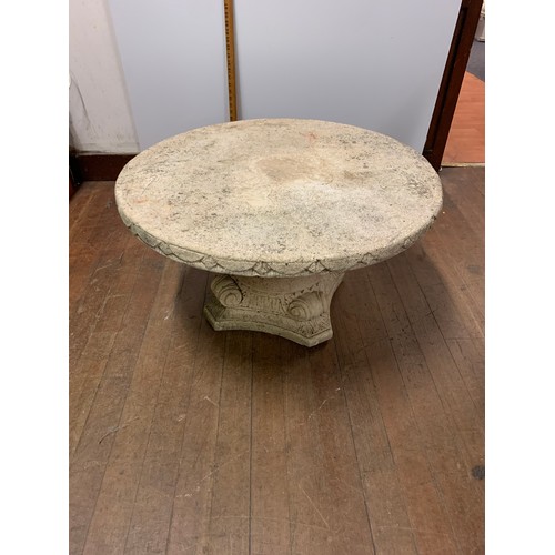 66 - Heavy stone, 2 piece garden table.
78cm diameter