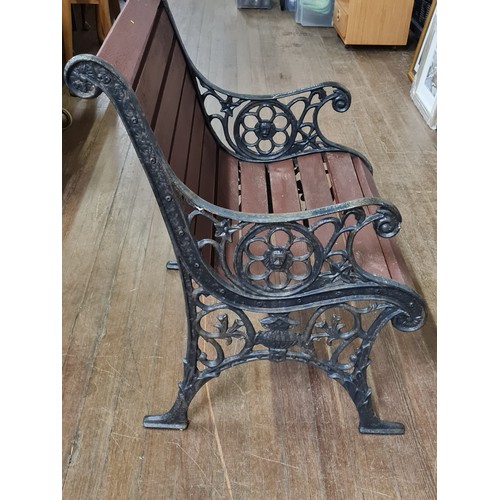 79 - One seater garden bench with cast iron sides.