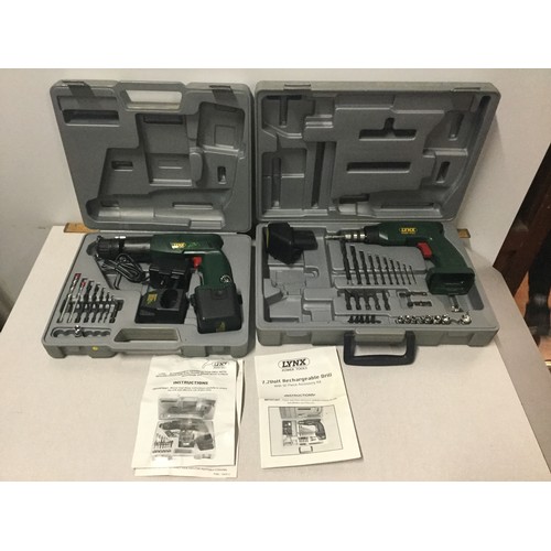 85 - 2 boxed Lynx drills and accessories. Only one charger works.