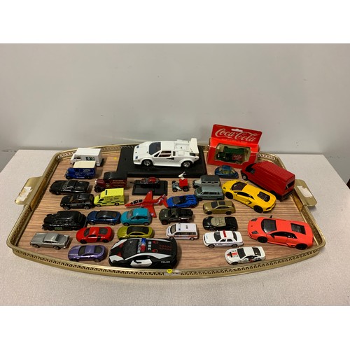 104 - Selection of play worn model cars.