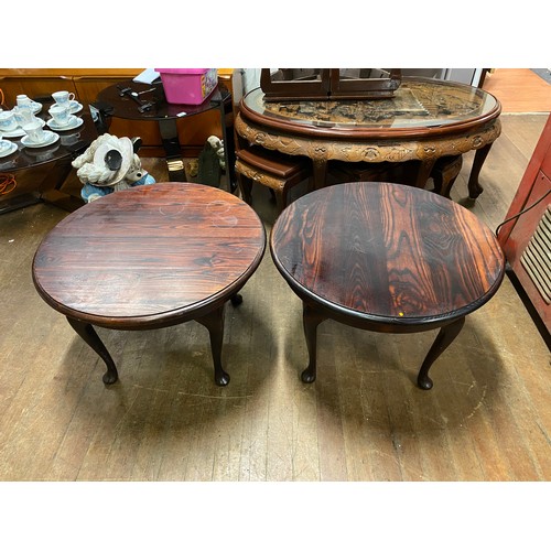 113 - Pair of vintage dark wood circular coffee tables.