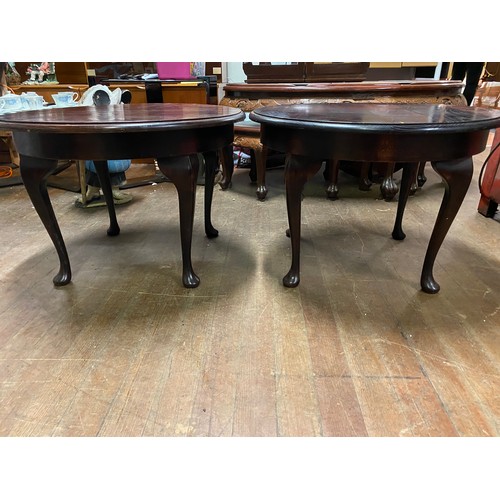 113 - Pair of vintage dark wood circular coffee tables.