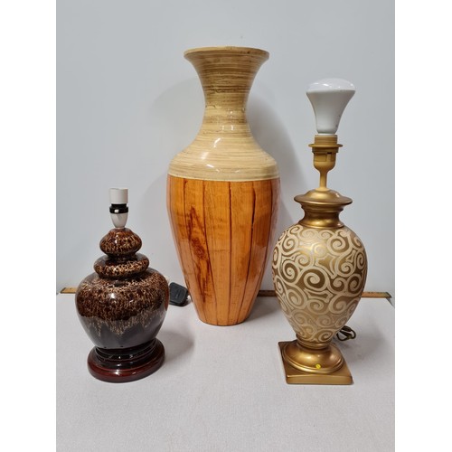 129 - 2 table lamps to include West German along with large paper Mache vase.
Tallest 60cm