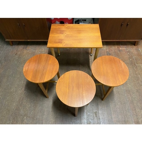 457 - Mid century teak Danish style nest of tables.