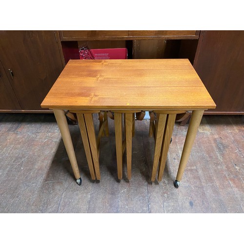 457 - Mid century teak Danish style nest of tables.