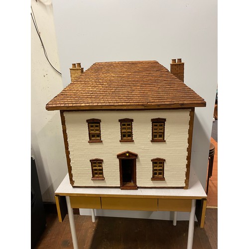 202 - Large vintage handmade wooden dolls house with electrics. approx H 77cm x L 81cm x D 60cm.