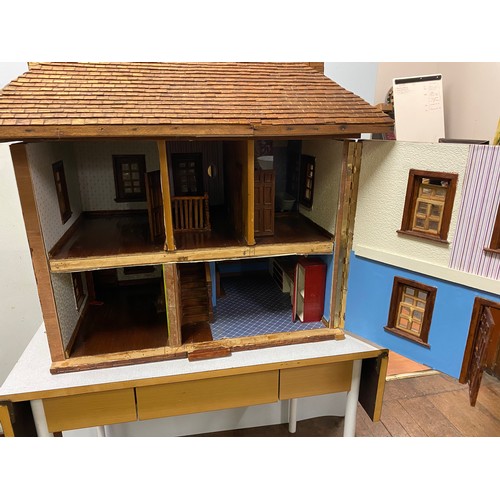 202 - Large vintage handmade wooden dolls house with electrics. approx H 77cm x L 81cm x D 60cm.