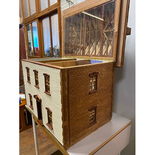 202 - Large vintage handmade wooden dolls house with electrics. approx H 77cm x L 81cm x D 60cm.