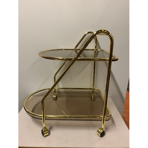 30 - Mid Century brass and glass serving trolley.