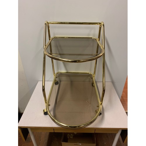 30 - Mid Century brass and glass serving trolley.