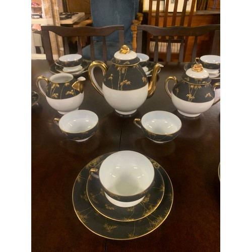 38 - 33 piece Japanese tea set. in gilded bamboo design.