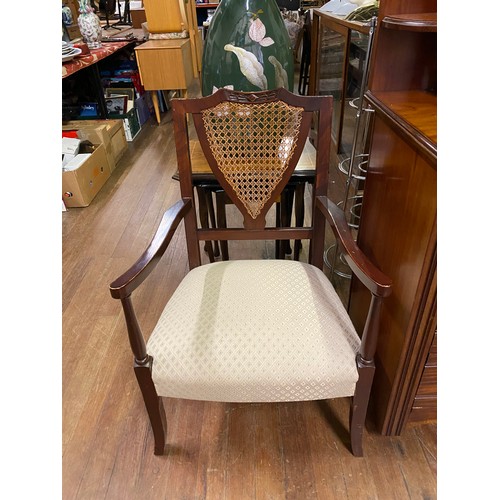 91 - Antique Berger back, wood framed arm chair.