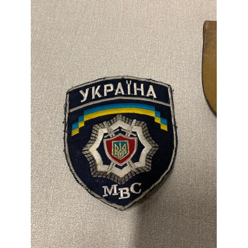 87 - Ukrainian badge, gun holder & compass.