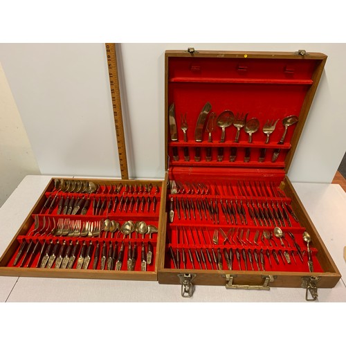 192 - large brass cutlery set in wooden case