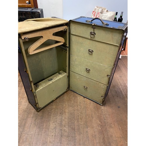 477 - Antique Travelling steamer wardrobe trunk by Oshkosh of Wisconsin.
106cm x 57cm x 51cm