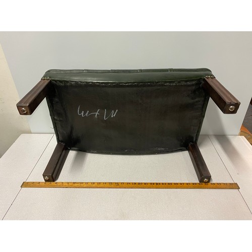 71 - Green leather Chesterfield footstool.