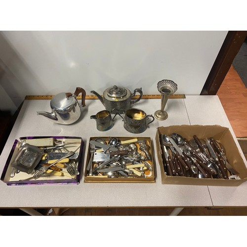 587 - Selection of plated ware to include cutlery and teapots etc.